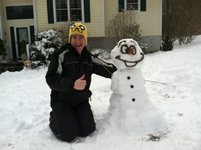 Our house sitter, Zach, and his Olaf.